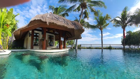 Outdoor pool, open 8:00 AM to 7:00 PM, pool umbrellas, sun loungers