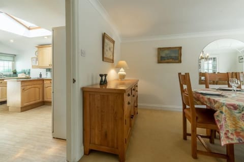Ground floor: Dining room leading into kitchen