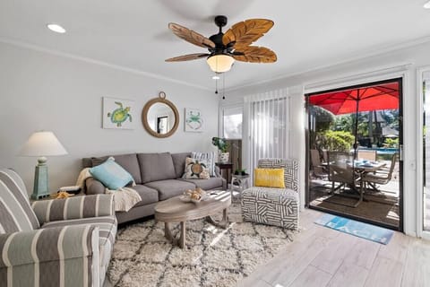 Enjoy our spacious and comfortable living room,with access to our priviate patio