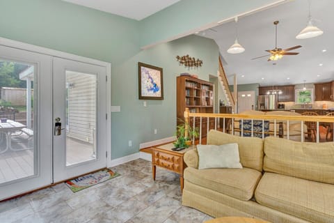 Inviting den with a big-screen TV and a selection of games, ideal for unwinding or hosting game nights.