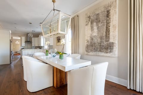 Dining room w/ plenty of seating.