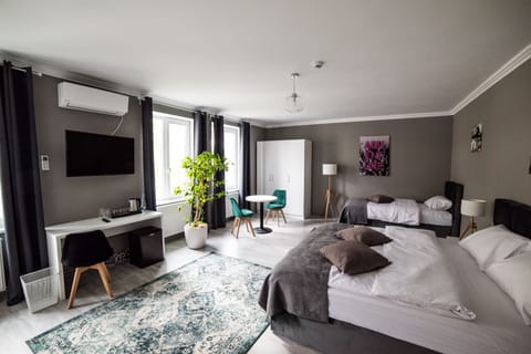 Comfort Triple Room | Minibar, desk, laptop workspace, soundproofing
