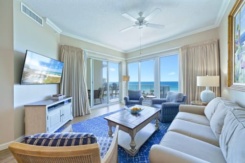 Elegant beachfront living space with floor-to-ceiling windows overlooking the Gulf.  Welcome to Crescent 411