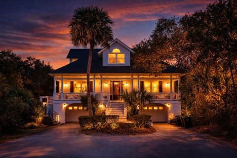 Welcome to this stunning 6-bedroom beach house, just a short walk from the sand in the desirable North Forest Beach area. This home features a heated pool and hot tub, perfect for relaxing after a day at the beach.