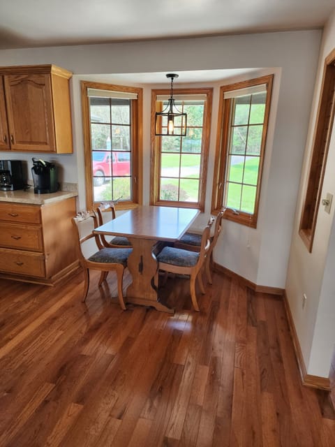 Breakfast Table between Front Door Entry and Kitchen
