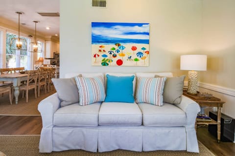 The living room opens into the dining area and kitchen.