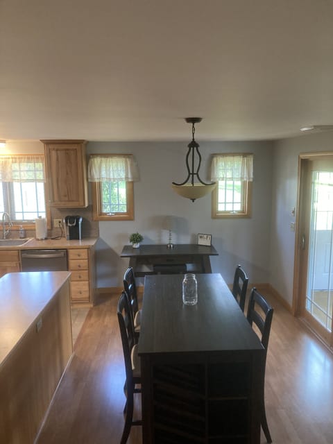 Dining area with pub height table for
4