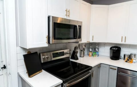 Kitchen stocked with cereal, breakfast bars and coffee for your stay.