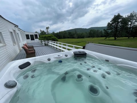 View from hot tub of back fields, and Wanosha and Tecumseh Mtns
