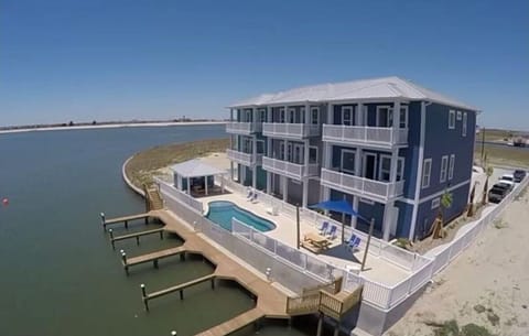 The common areas share a heated pool, picnic tables, outside shower and  bathroo