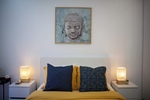 Bedroom:Serene ambiance with vibrant decor & soft lighting for a restful night