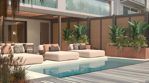 Sunlit pool moments just steps from the Mediterranean and sandy shore.