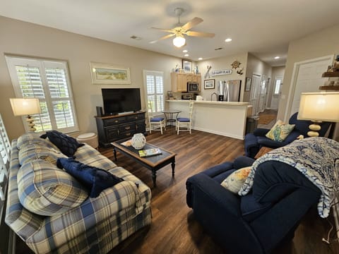 1st floor open living, dining and kitchen space with bright natural light!