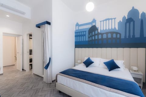 Superior Quadruple Room | Minibar, in-room safe, individually decorated, individually furnished