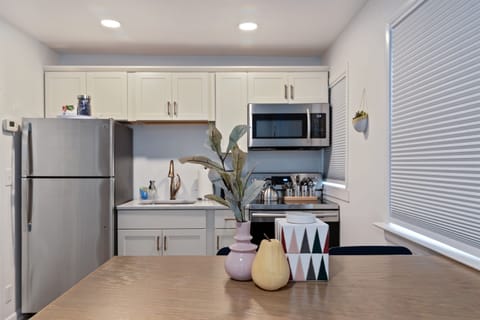 While small, the kitchen has everything you need to prepare and enjoy a meal together.