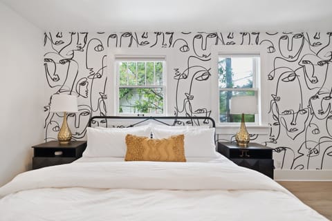 Bedroom has a king bed and a twin daybed (with a second twin trundle bed below it)