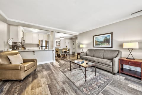 Deluxe Suite, 1 Bedroom | Living area | 60-inch flat-screen TV with cable channels, TV