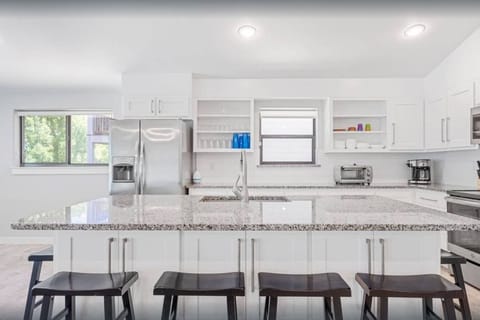 Large kitchen island with seating area for 6+ people
