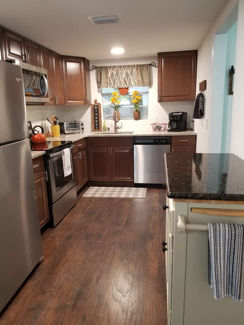 Updated kitchen with all the tools available to prepare meals if you choose