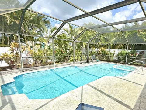Screened heated pool/spa, and deck area.,