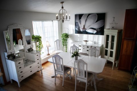 Dining table with extra leaves available to seat up to 10. French Country decor.