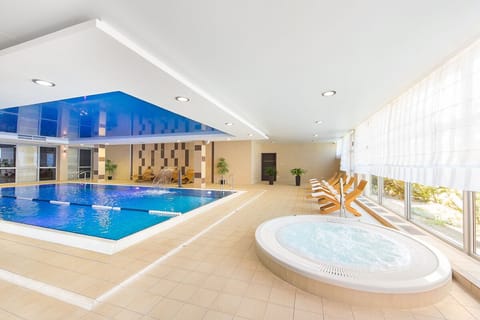 Indoor pool, open 9:00 AM to 10:00 PM, sun loungers, lifeguards on site