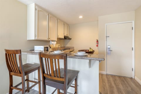 Suite, 1 King Bed, Non Smoking, Kitchenette | Down comforters, in-room safe, individually furnished, desk