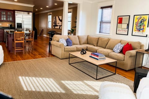 The open family room, kitchen and dining space are ideal for hosting large or extended family gatherings.