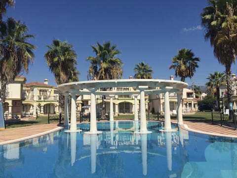 Seasonal outdoor pool, pool umbrellas, sun loungers