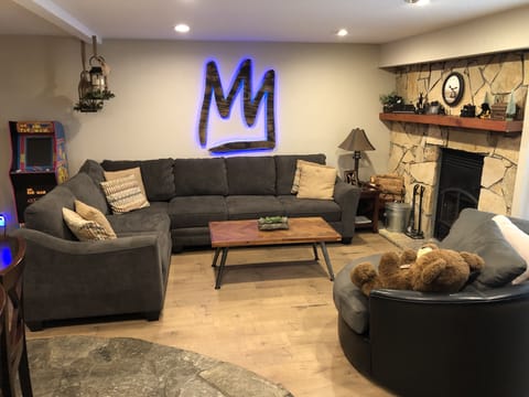 Living Room w/Large comfortable sectional and large barrel chair 