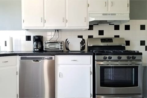 Whip up your next gourmet meal in the full kitchen. (1st Floor)
