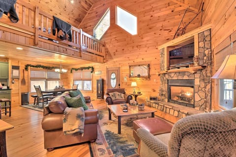 Spacious main living area with fireplace, perfect for relaxing and gathering together
