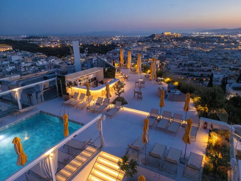 Seasonal outdoor pool, pool umbrellas, sun loungers