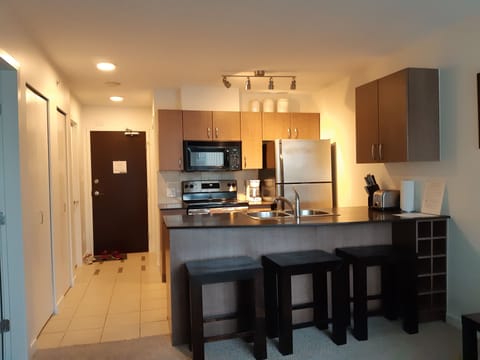Fully equipped kitchen with stainless steel appliances