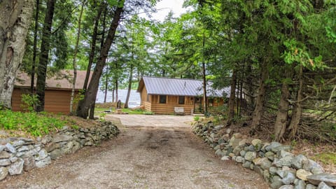 More parking in front of the cabin and level yard. 