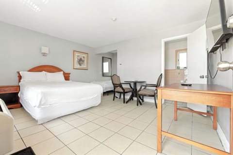 Basic Double or Twin Room, Multiple Beds | Laptop workspace, iron/ironing board, free WiFi, bed sheets