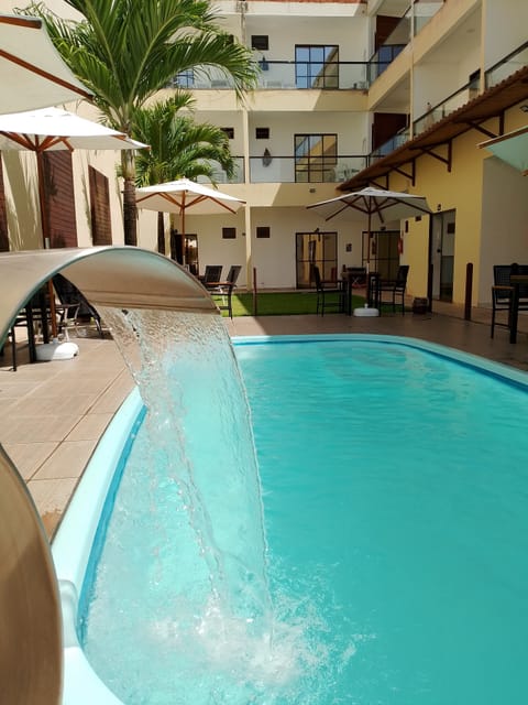 Outdoor pool, open 8:00 AM to 8:00 PM, sun loungers