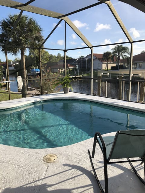 Pool area over looking salt water canal 