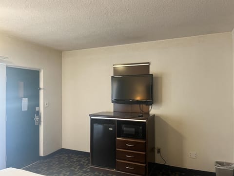 Blackout drapes, soundproofing, iron/ironing board, free WiFi