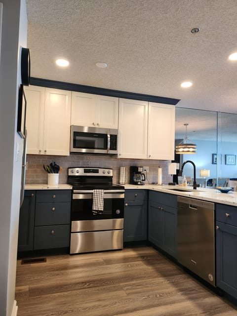 Fully stocked kitchen with modern appliances - perfect for home cooked meals!