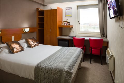 Free minibar items, desk, laptop workspace, blackout drapes