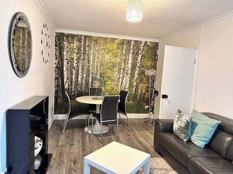 Apartment | Living area | TV, fireplace