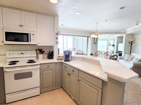 Newly renovated kitchen with quartz counters