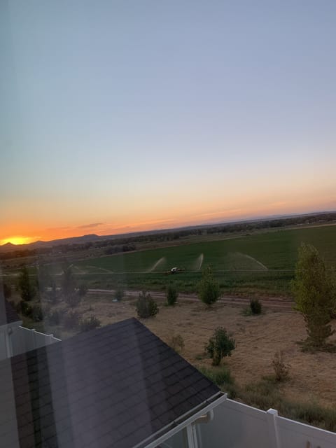 Sunset view from the back covered patio or bedroom windows.