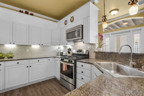 Coconut Cove - Kitchen Featuring Stainless Steel Appliances