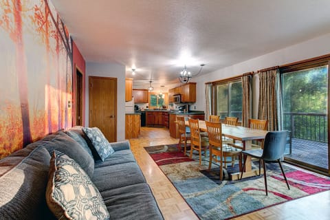 A dinner table w/ a view. The table has seating for up to 10 people.