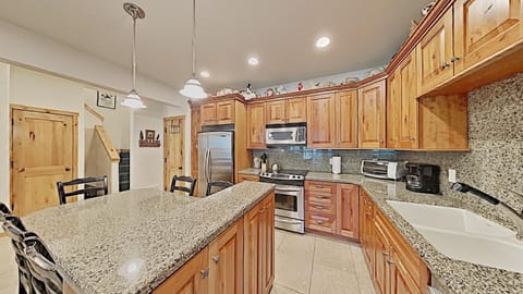 Full Kitchen And Dining Area