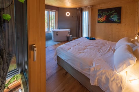 Exclusive Tree House | Down comforters, in-room safe, blackout drapes, free WiFi