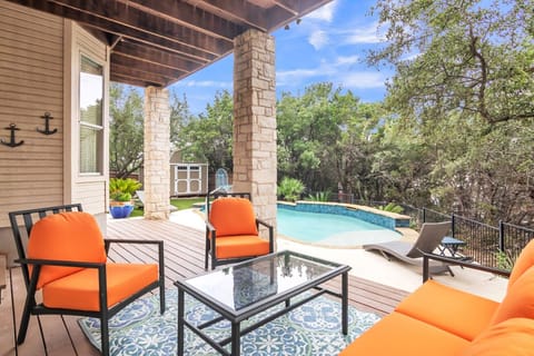Relax in the shade and watch the kids in the backyard private pool!
