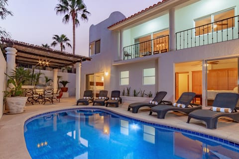 Inviting outdoor terrace with swimming pool, jacuzzi and patio furniture